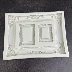 White silicone mold featuring baroque relief photo frames for fondant cake decoration