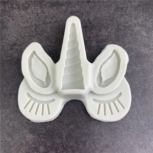 White silicone unicorn mold with horn, ears and eyelashes for fondant cake decoration