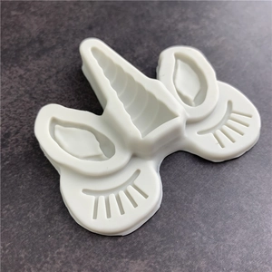 Unicorn silicone mold for fondant and chocolate featuring horn ears and eyelash details