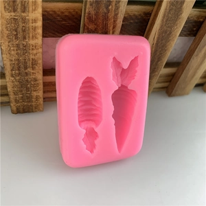 Pink food grade silicone mold with carrot shapes for fondant cake decorating and DIY baking