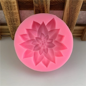 Pink round silicone mold with layered flower petal design for DIY soap and fondant making