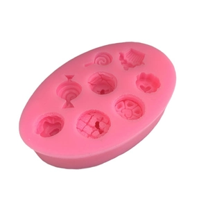Pink silicone mold for DIY lollipops and mini cupcakes with eight diverse shapes