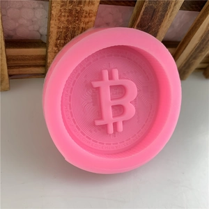 Pink silicone mold featuring Bitcoin logo for fondant cakes, chocolates, and handmade soaps