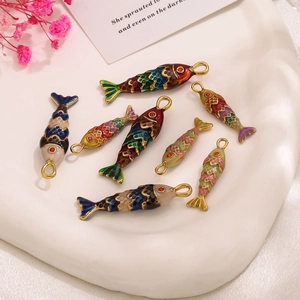 Colorful stainless steel fish pendants for DIY jewelry making in various gradient finishes