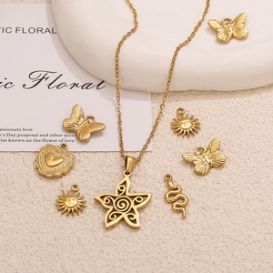 Vintage gold stainless steel necklace set with bow heart and celestial sun pendants