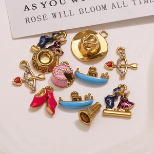 Detailed close-up of colorful enamel charms featuring cowboy hats and high heels charms