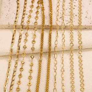 Vertical display of diverse gold-plated stainless steel chain necklaces on stone stand