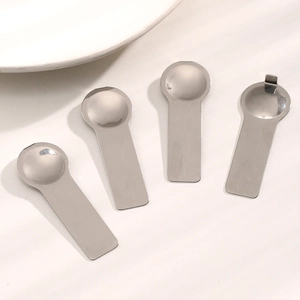 Polished stainless steel modular bracelet tool set with 4 pieces on white surface