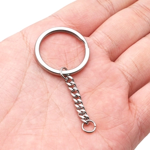 Classic silver stainless steel key ring with flat surface and attached curb chain link