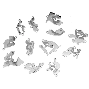 Flat lay of diverse stainless steel family silhouette charms for DIY jewelry making