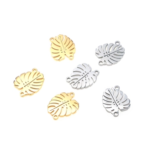 Monstera leaf stainless steel jewelry charms in gold and silver finish with dual loops