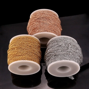 Three rolls of DIY jewelry extension chains in gold, silver, and rose gold on spools