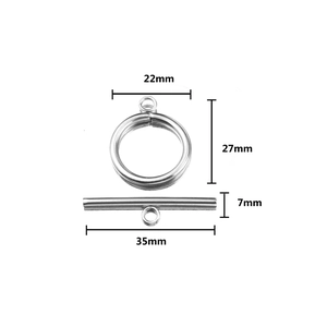 Detailed macro view of stainless steel OT toggle clasp set with precise measurements