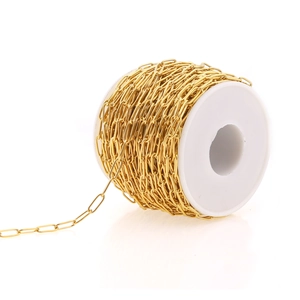 Golden stainless steel oval paperclip chain on a white spool for DIY jewelry making