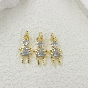 Detailed view of three gold triangle zircon girl pendants for DIY jewelry making