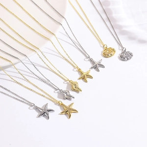 Collana con Pendentia a Forma di Stella Marina Conchiglia in Rame e Zirconia Oro Argento Serie Marina Gioielli da Donna per Vacanze al Mare