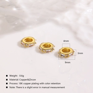 Macro view of 18K gold plated copper spacer beads with zircons for jewelry making