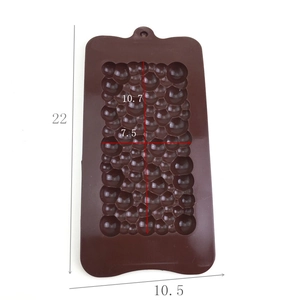 Detailed view of brown silicone mold with bubble texture and precise dimensions