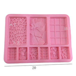 Pink silicone mold for waffles and chocolate with geometric patterns and dimensions