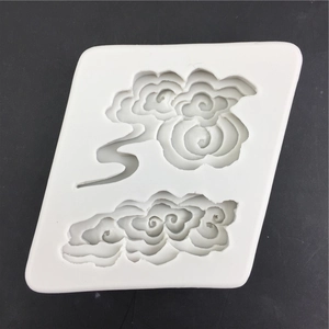 White silicone mold featuring traditional Chinese auspicious clouds for cake decorating