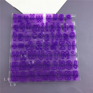 Purple plastic alphabet and number stamp set for fondant cake and clay decorating