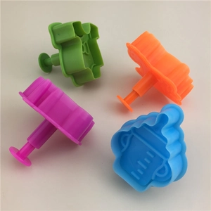 4-piece baby themed spring loaded cookie cutters with baby bottle and horse shapes