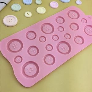 Pink silicone mold for button shaped chocolates and cake fondant decorations