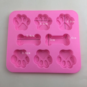 Pink silicone mold with 6 cat paw and 2 bone cavities for DIY baking and soap making