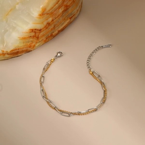 Two-tone double layer bracelet with gold bead chain and silver paperclip chain links