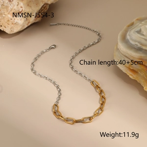 Detail view of two-tone gold and silver paperclip chain necklace with lobster clasp