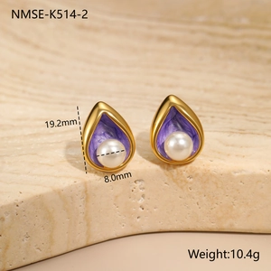 Detail of 18K gold plated teardrop earrings with purple enamel and 8mm white pearl