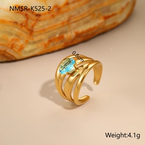Detail view of 18K gold plated hollow ring with blue zircon and weight specifications