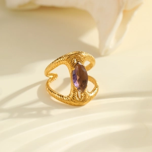 Irregular 18k gold plated stainless steel ring with marquise cut purple zircon stone