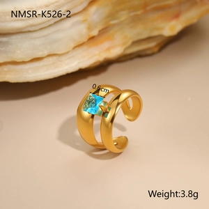 Macro shot of an 18K gold-plated irregular ring featuring a square blue zircon stone