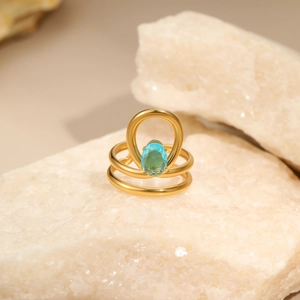 Modern 18K gold plated stainless steel hollow ring with blue oval cut zircon stone
