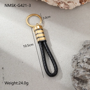 Detail view of woven leather keychain with gold metal ring and 10.5cm length markings