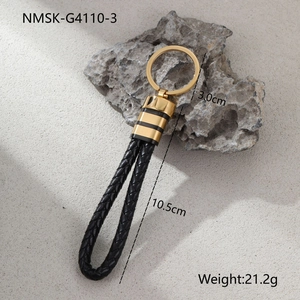 Detailed view of black woven leather keychain with gold ring, 10.5cm length and 21.2g weight