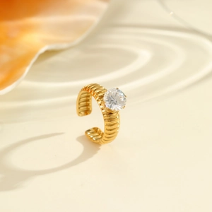 Close-up of 18K gold plated textured ring with large cubic zirconia and ribbed details