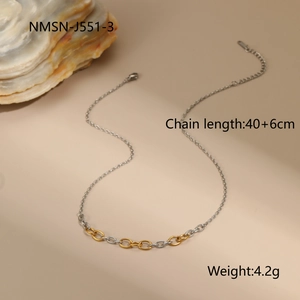 Detail view of two-tone gold and silver link necklace with adjustable chain length