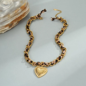Leopard print ribbon necklace with 18K gold plated heart pendant and hammered texture finish
