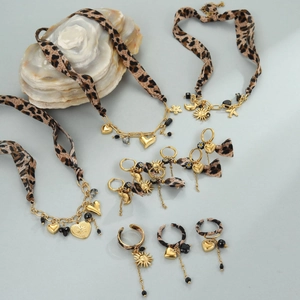 Gouden roestvrijstalen sieradenset met luipaardprint en hart-zon hangers
