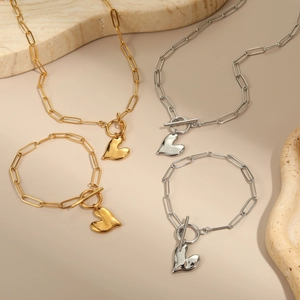 Ketting en armband set met onregelmatige harthanger in goud en zilveren afwerking