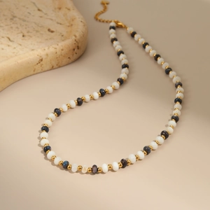 Bohemian beaded necklace with natural pearls, blue stones and stainless steel chain