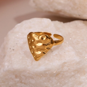 Golden heart-shaped titanium steel ring with textured lava finish and adjustable open band