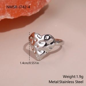 Detailed view of silver heart-shaped stainless steel ring showing 1.4cm size and texture