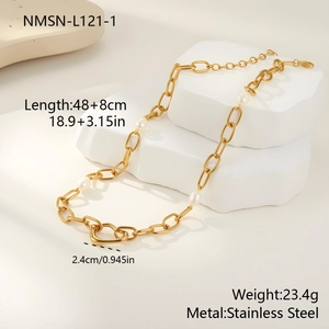 Detail view of 18k gold plated chain necklace with freshwater pearls and heart clasp
