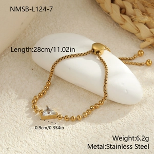 Detail of adjustable gold stainless steel bracelet with triangular zircon inlay and dimensions