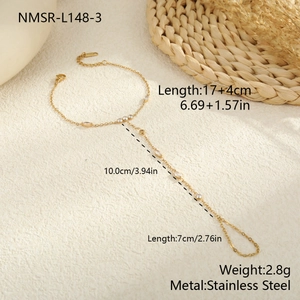 Detail showing dimensions of gold stainless steel finger bracelet with marquise zircon