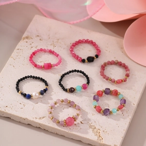 7-piece set of natural stone beaded elastic rings with 18K gold plated metal accents