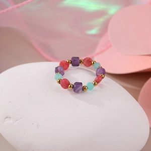 Beaded natural stone ring with red, purple, and blue beads and 18K gold-plated accents